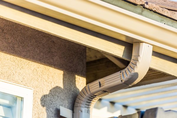 House with New Seamless Aluminum Rain Gutters.